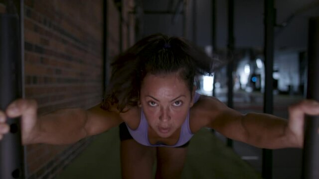 Push through your limits! Strong and powerful female athlete. Pushing through with strength and focus. There is nothing Impossible. Shot in 4k.  