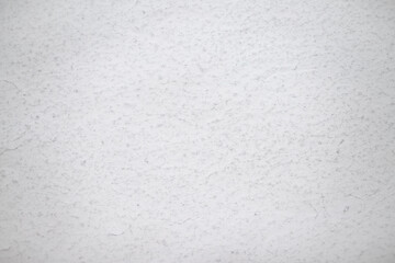 Light wall with abstract spots. Beautiful gray, white texture, abstract wall surface background, vintage surface texture with copy space, unusual spotty surface.