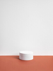 concrete podium on earthy tone background. Pedestal, place for product