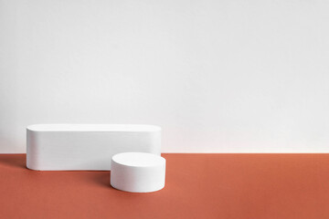 concrete podium on earthy tone background. Pedestal, place for product