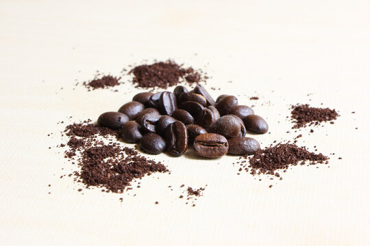 Coffee beans sugar and creamer on wood background © nitinut380