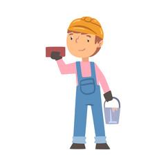 Boy Construction Worker with Bucket and Brick, Cute Little Builder Character Wearing Blue Overalls and Hard Hat with Professional Tools Cartoon Style Vector Illustration