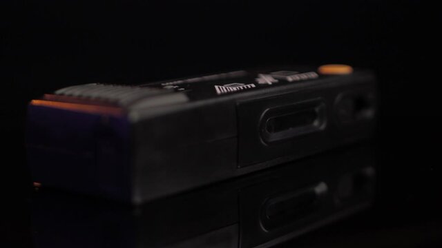 Vintage Pocket Photo Camera For 110 Film, Spinning Close Up, Black Background