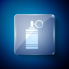 White Hand grenade icon isolated on blue background. Bomb explosion. Square glass panels. Vector.