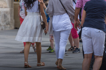young woman with white skirt in the city