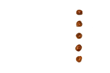 hazelnut drop on white background