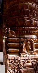 Wooden hindi figurines at temple in Kathmandu, Nepal