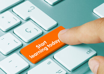 Start learning today - Inscription on Orange Keyboard Key.