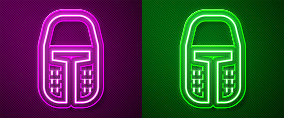 Glowing neon line Medieval iron helmet for head protection icon isolated on purple and green background. Vector.