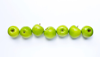 Green apples on white background. Copy space
