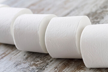 Toilet paper rolls stacked at home