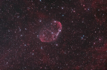 Naklejka na ściany i meble The Crescent nebula (NGC 6888) in the constellation of Cygnus, It is formed by the fast stellar wind from the Wolf-Rayet star WR 136