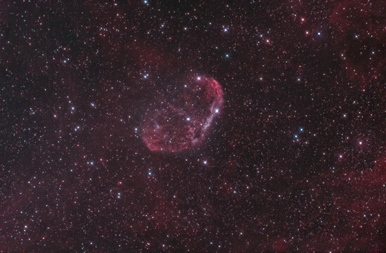The Crescent nebula (NGC 6888) in the constellation of Cygnus, It is formed by the fast stellar wind from the Wolf-Rayet star WR 136