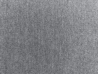 Fototapeta na wymiar dark gray fabric cloth surface texture wall background.