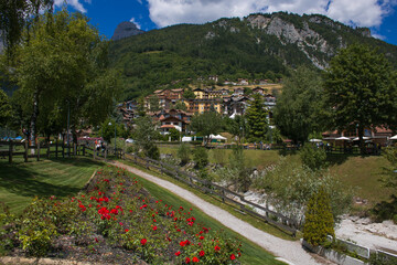Fototapeta na wymiar Summer view of historic center of Molveno little town in the famous lake, Trentino, Italy