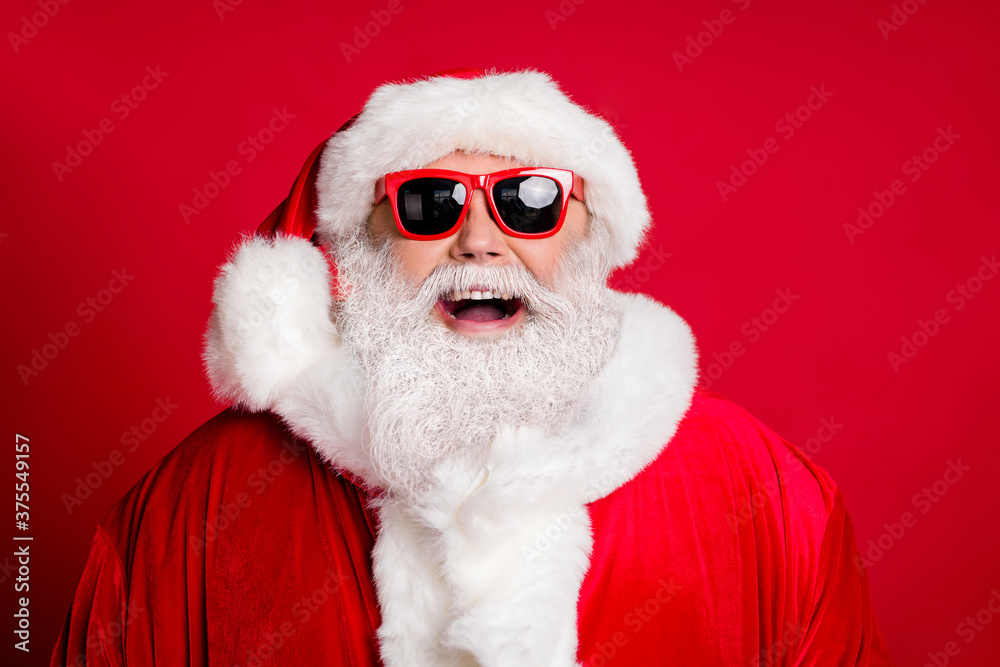 Sticker Closeup portrait photo of retired old man grey beard open mouth cheerful smiling make wish newyear eve family holiday wear santa costume sunglass headwear isolated red color background