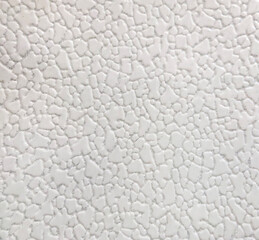 Relief texture of the wall surface. Background design. Raster image. Paper texture.