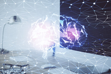 Double exposure of work space with computer and human brain drawing hologram. Brainstorm concept.