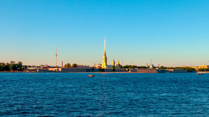 Evening view of the Peter and Paul fortress and the Neva river.