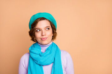 Close-up portrait of her she nice-looking attractive lovely winsome charming cute cheerful dreamy girl wearing beret thinking isolated over beige pastel color background