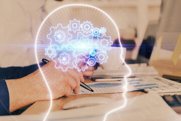 Brain multi exposure icon with man hands background.