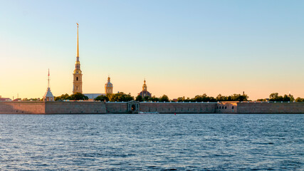 Evening view of the Peter and Paul fortress and the Neva river.