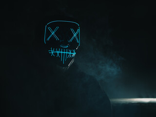 Portrait of an anonymous hacker in a neon mask, Halloween mask