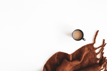 Autumn composition. Cup of coffee, plaid on white background. Autumn, fall concept. Flat lay, top view