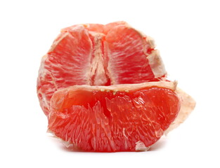Peeled grapefruit half isolated on white background
