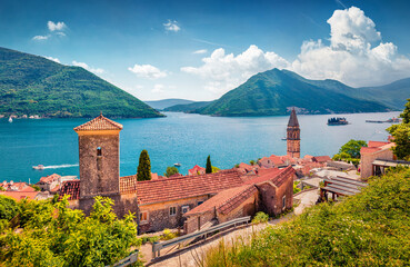 Bright morniung view of Perast town. Amazing spring scene of Kotor Bay. Sunny landscape of Montenegro, Europe. Traveling concept background. Splendid seascape of Mediterranean sea. - obrazy, fototapety, plakaty