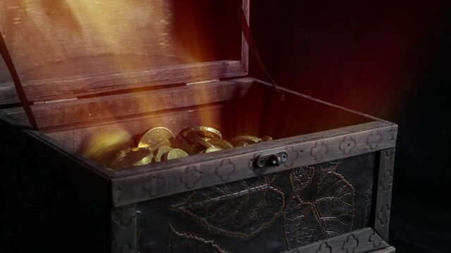 Gold coins fall into the treasure chest