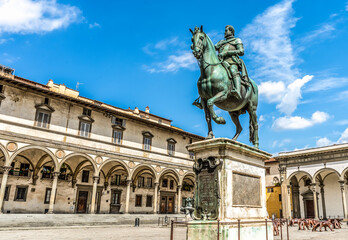 Piazza della Santissima Annunziata, a square in Florence, Tuscany, Italy, with the e bronze...
