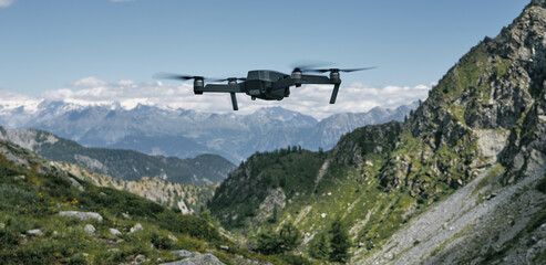 Fototapeta na wymiar Close up image of drone flying towards mountains in a sunny day.
