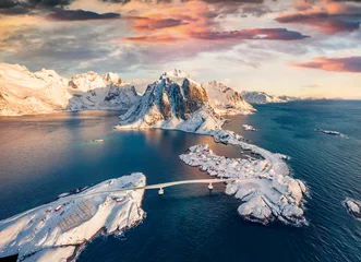 Wall murals Bedroom Exotic morning view from flying drone of Hamnoy port with Festhaeltinden mount on background, Norway, Europe. Splendid outdoor scene of Lofoten Islands. Beautiful winter seascape of Norwegian sea.