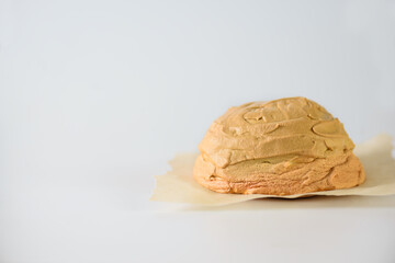 Homemade cloud bread, airy dessert made from sugar and eggs on a white background. Horizontal orientation, copy space.