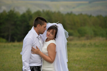 a young couple celebrates their wedding anniversary in the latter on self-isolation, they laugh, play and have fun