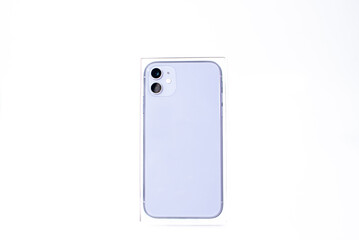 Purple smartphone with two cameras on a white background