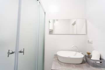 Naklejka na ściany i meble Modern twin bathroom with sinks, toilet and shower.