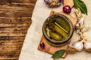 Marinated pickled cucumbers with spices and herbs