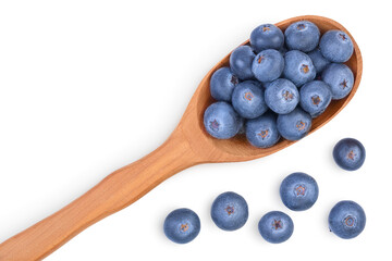 fresh ripe blueberry in wooden spoon isolated on white background with clipping path . Top view with copy space for your text. Flat lay