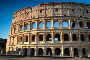 Obraz premium The Colosseum in Rome at sunrise, Italy
