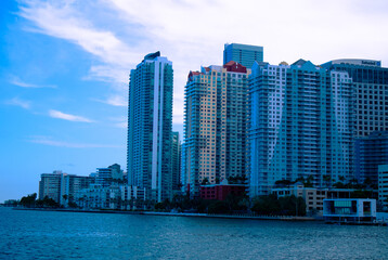 Fototapeta na wymiar Buildings next to the Miami South Channel in Brickell Miami, Florida, Skyline of Brickell near the the Miami South Channel, Buildings on Brickell Ave during the daytime, Apartments in Brickell, City