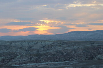 sunrise from behind the rocks