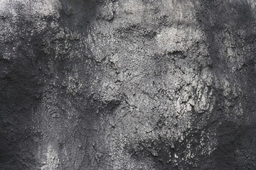 Close-up to rough surface on gray and white rocks background