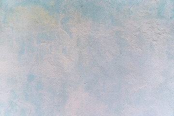 Textured blue natural wall background old paint with cracks
