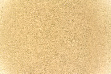 Yellow background texture natural concrete wall close up
