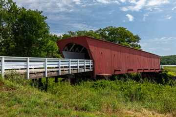 Fototapeta na wymiar An Old Red Wooden Covered Bridge
