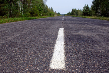 Fototapeta premium asphalt road in the countryside