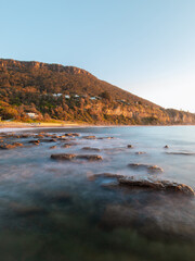 Fototapeta na wymiar Rocky coastline of Coalcliff Beach in the morning, Sydney, Australia.
