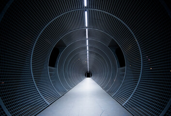 Túnel circular con iluminación - obrazy, fototapety, plakaty